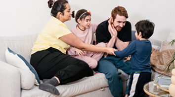 photo of family on sofa