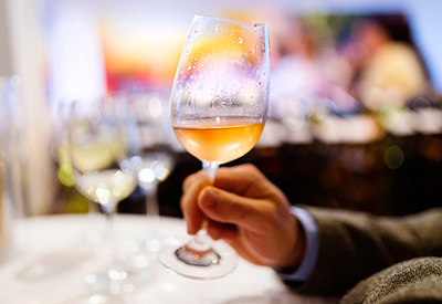 Man holding a glass of wine