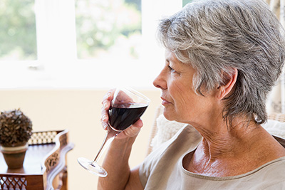 Woman with a glass of wine